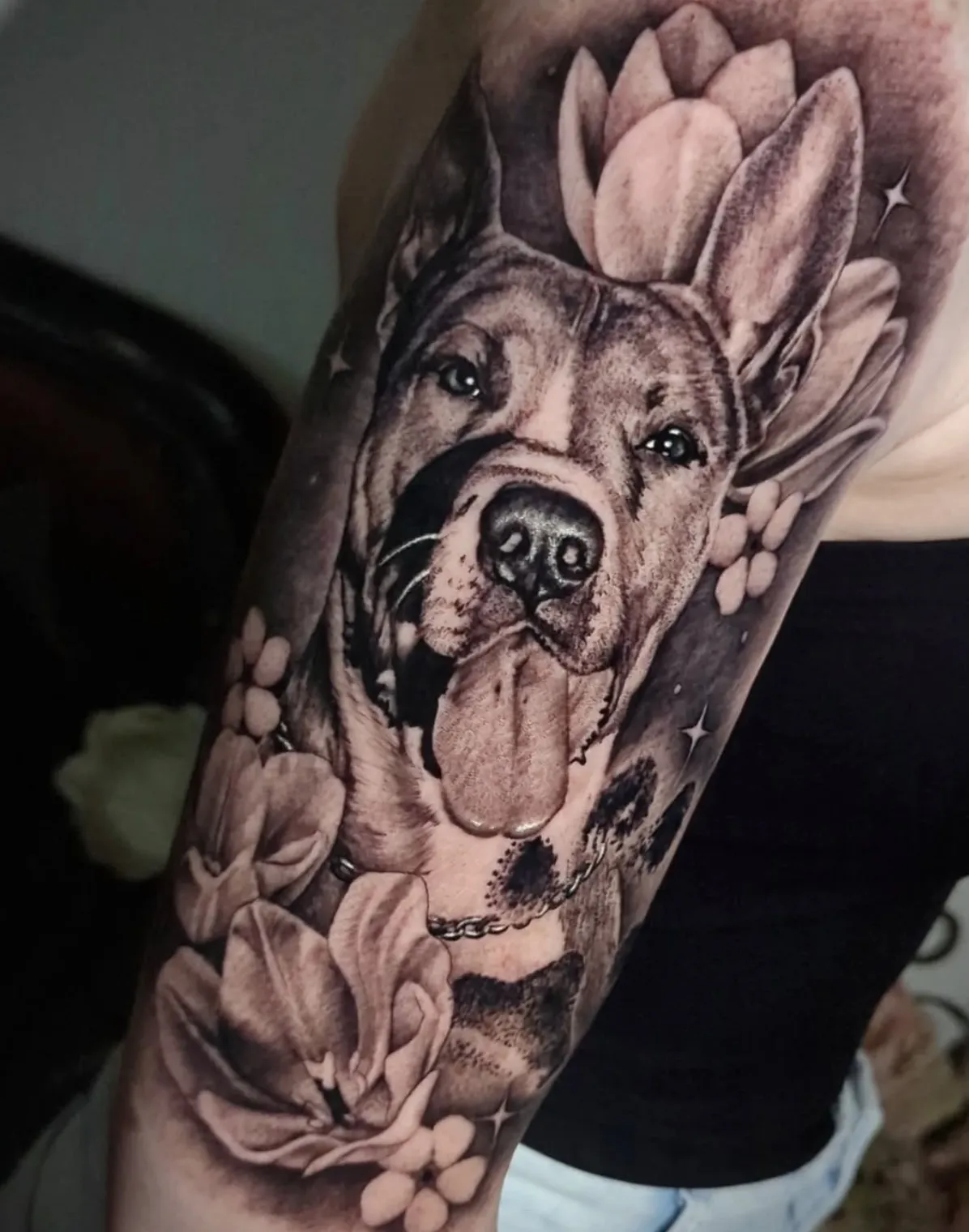 Realistic dog portrait tattoo with exceptional detail and expression